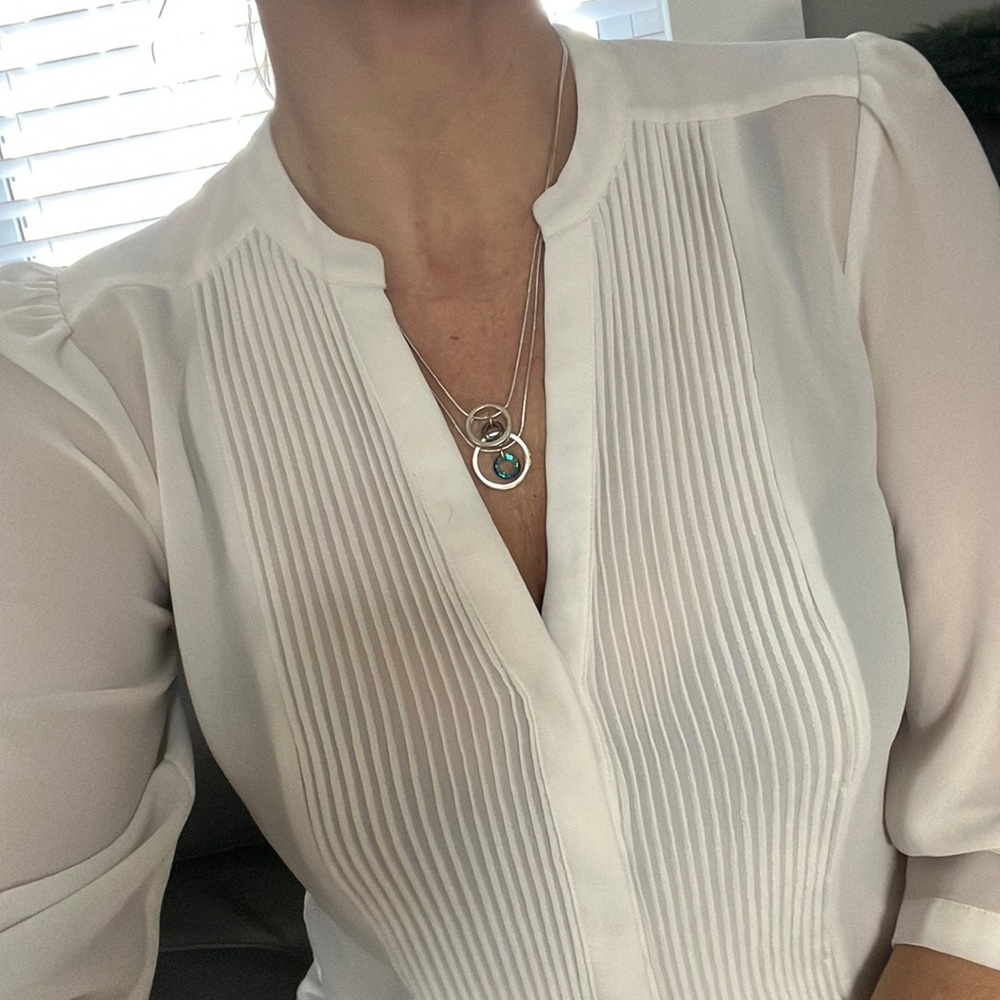 Twirled pendant warm and cool silver necklace